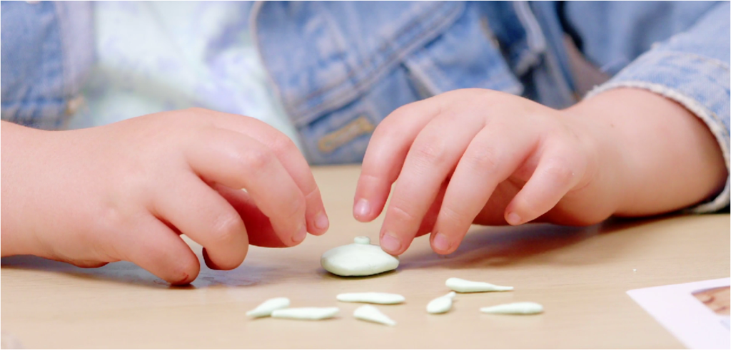 Kid playinng with Craftenly air dry clay